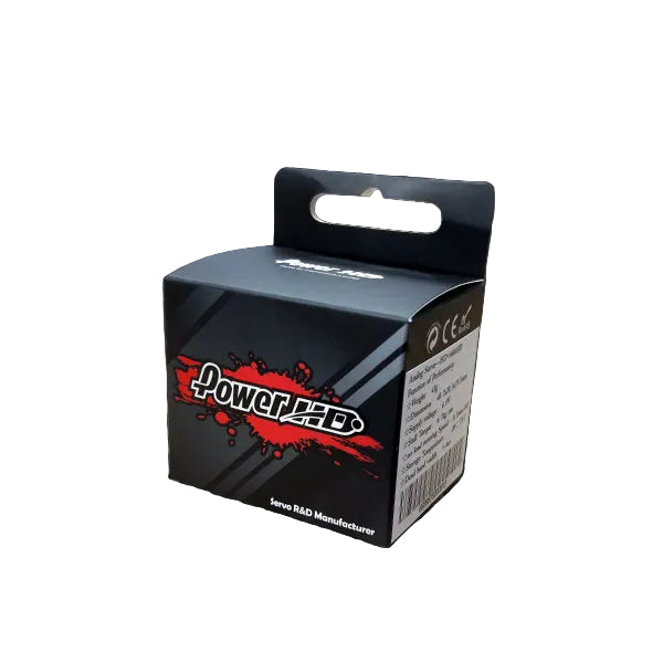 Black packaging box with red and white design on a dark textured background