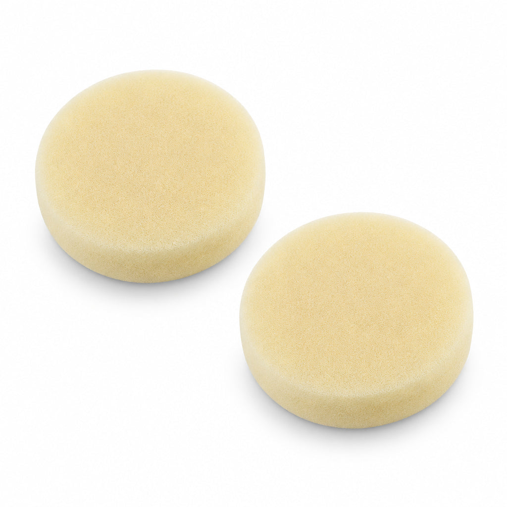 Two yellow RC foam Habao air filter sponges on a white background