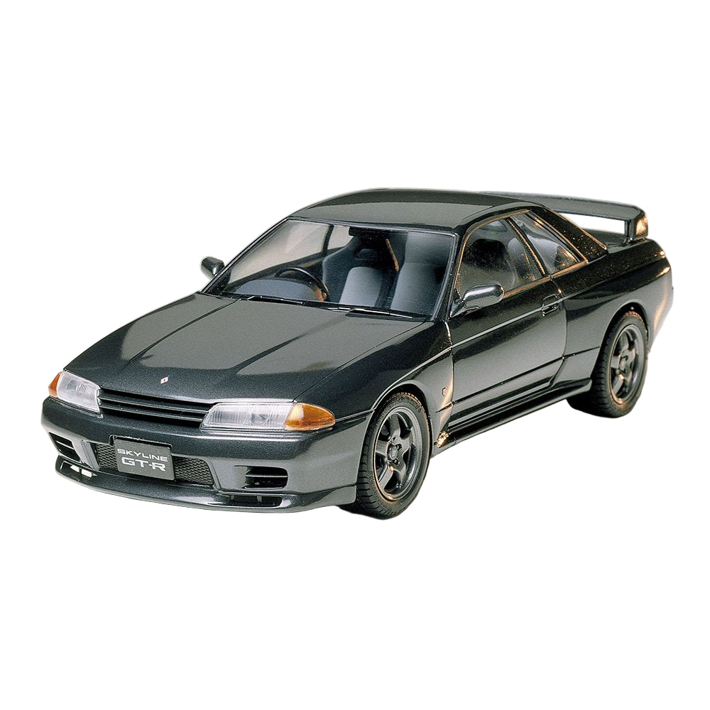 Model of a black Nissan Skyline GT-R on a white background