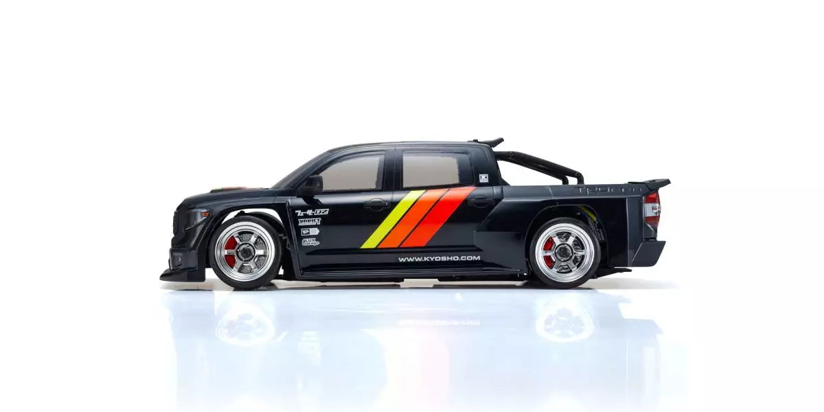 Black toy car with red and yellow stripes on a white background