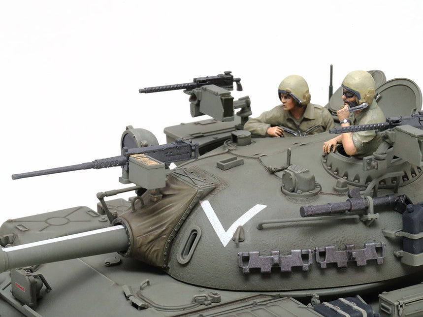 Tamiya 1/35 Tiran 5 Israeli Tank Plastic Model Kit with two figures inside on a white background