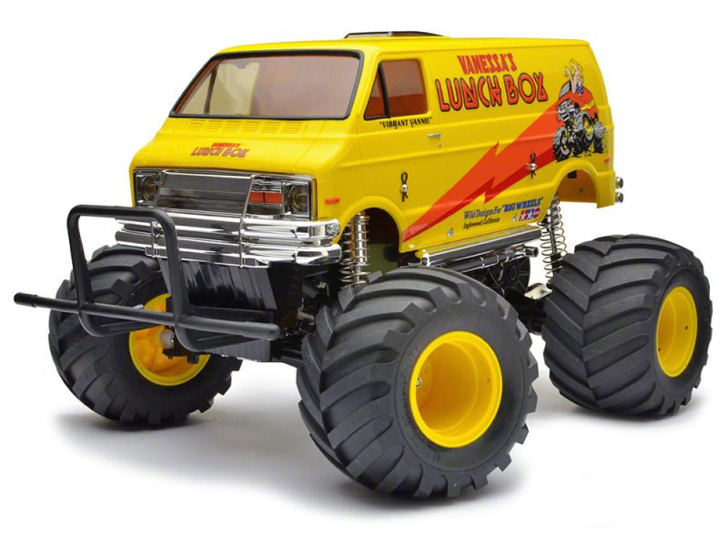 Yellow TAMIYA LUNCH BOX monster truck with 'Vanessas Lunch Box' branding' on a white background
