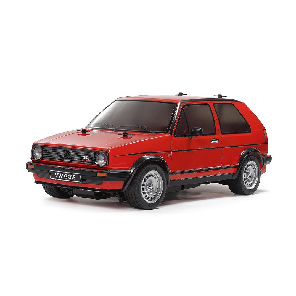 Red Volkswagen Golf model car on a white background