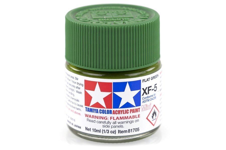 A small bottle of Tamiya Acrylic Mini XF-5 Flat Green paint.