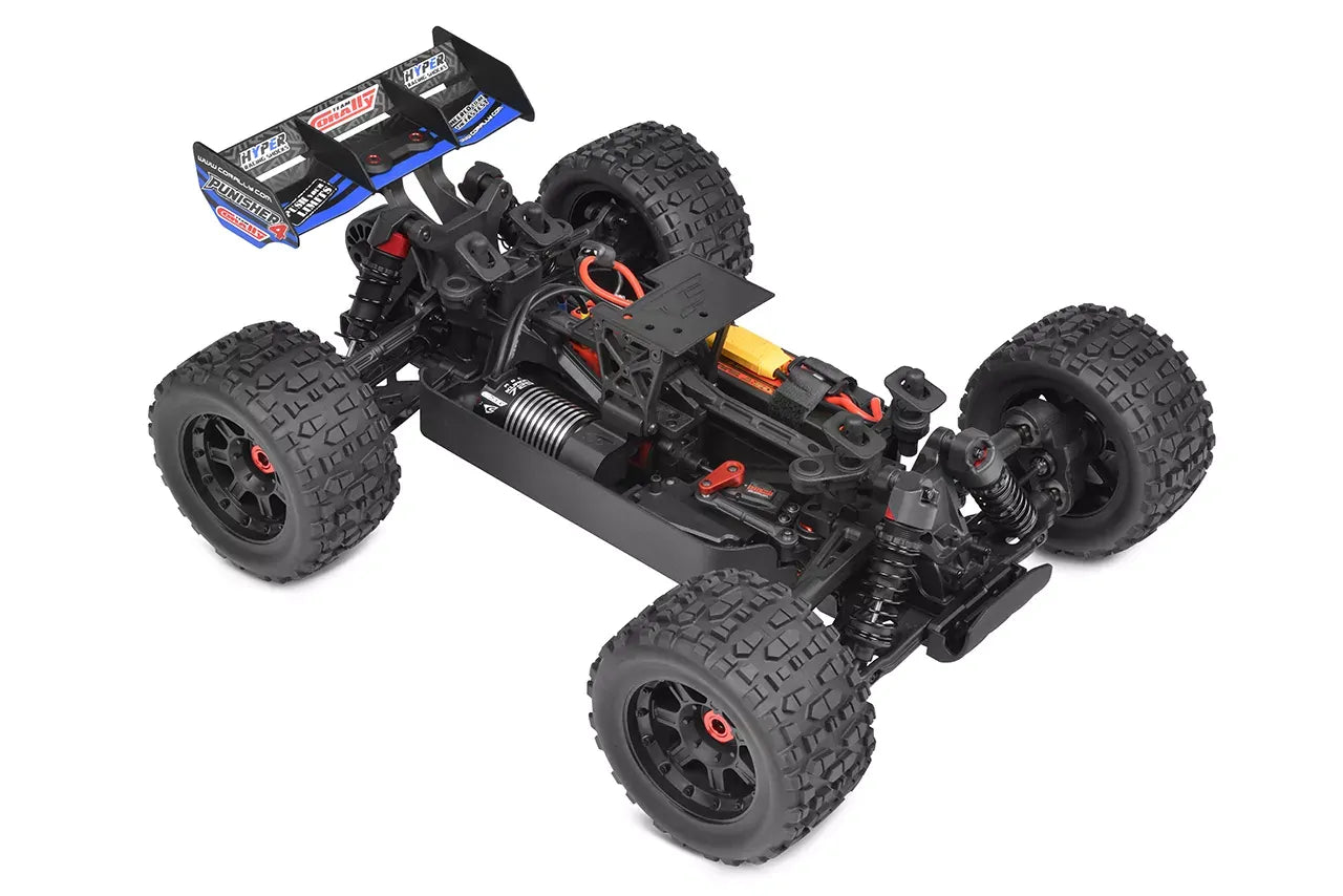 Team Corally Punisher4 off-road RC car chassis with body removed showing electrical components with large wheels on a white background