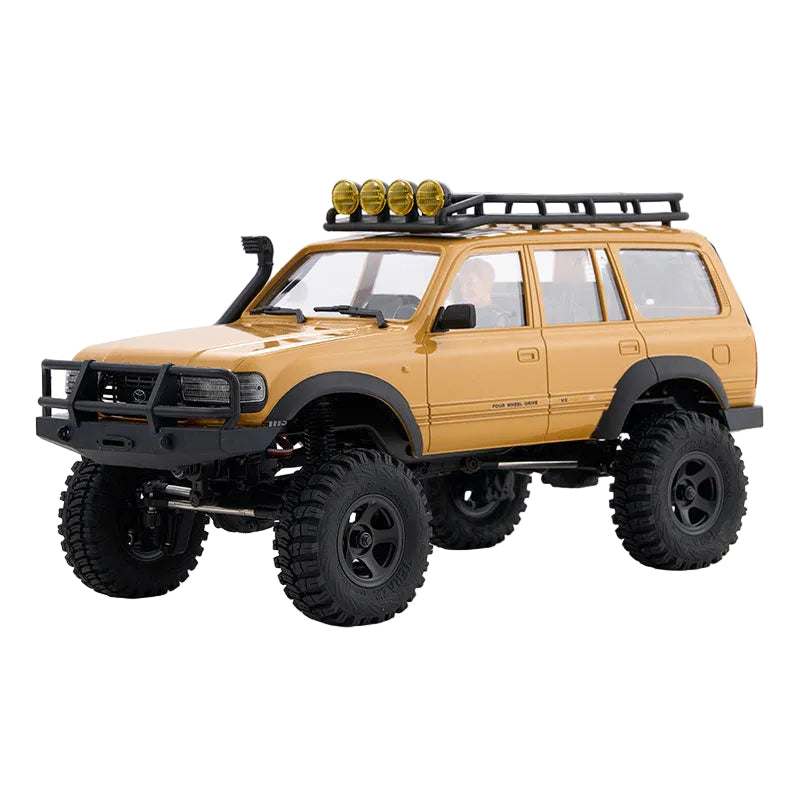 Model of a yellow off-road vehicle with large black tires on a white background