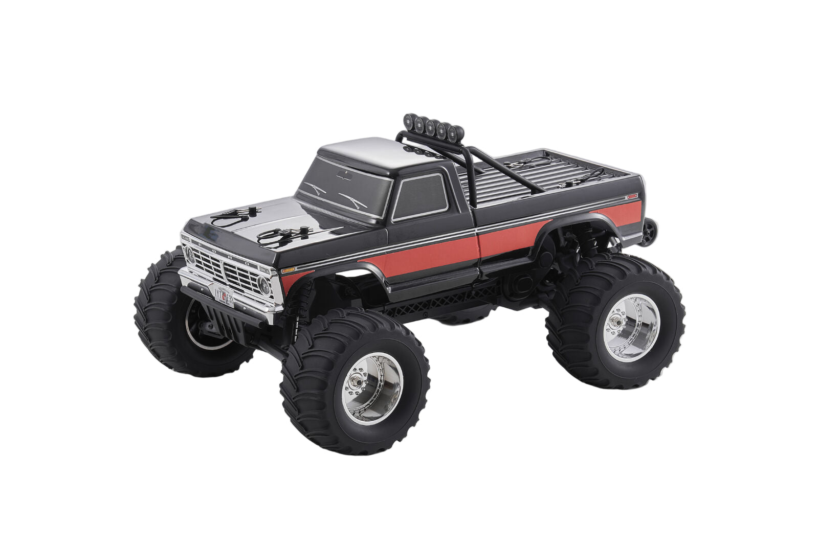 Model truck with large wheels on a gray background