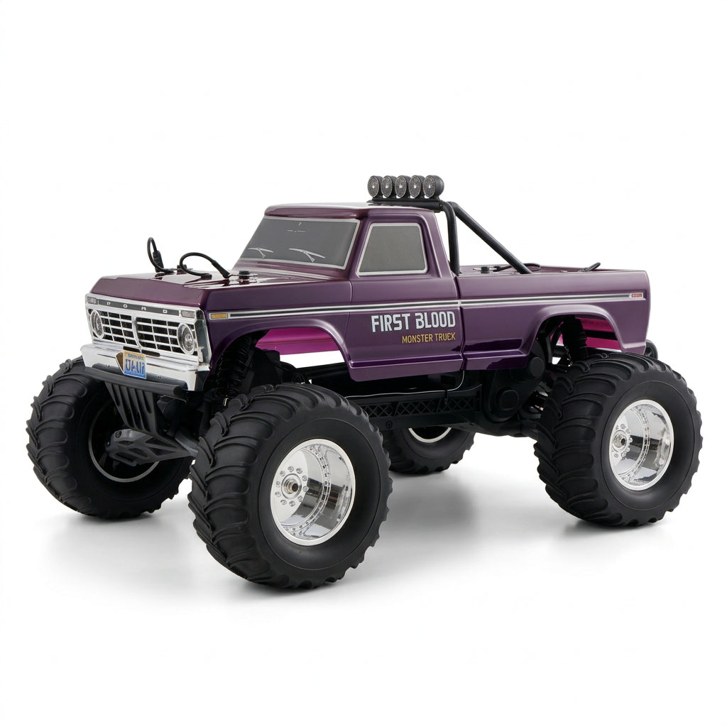 Model truck with large wheels and 'First Blood' branding on a gray background