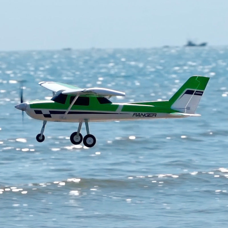 FMS 1220mm Ranger EP V3 Green RC airplane performing water landing