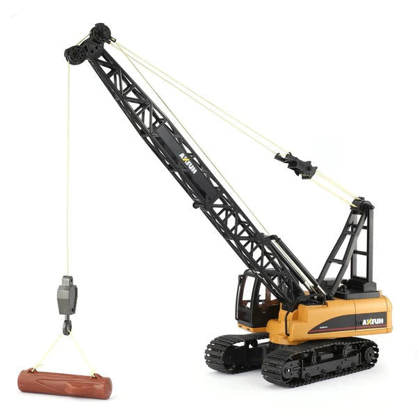 RC Model of a logging crane with tracks and lifting a log on a white background