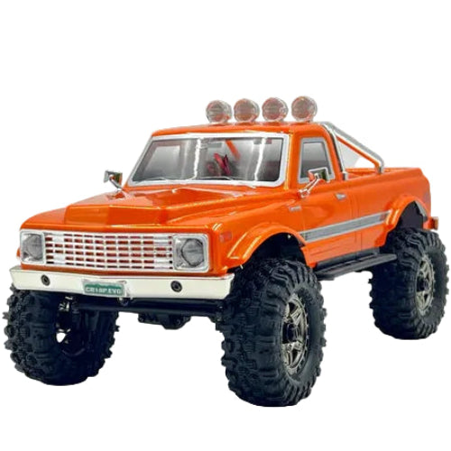 Orange model truck with large wheels on a white background