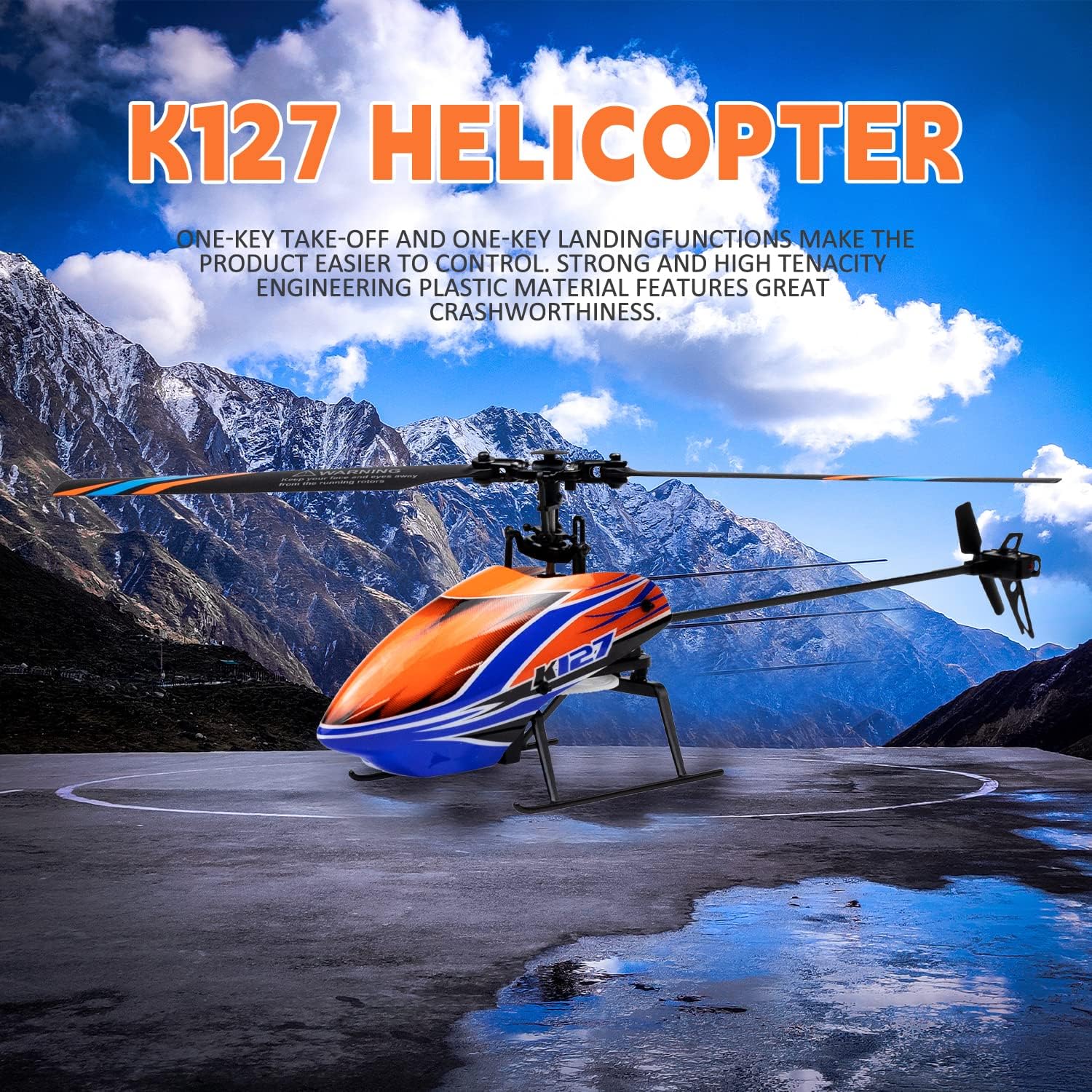 K127 helicopter with mountainous landscape in the background