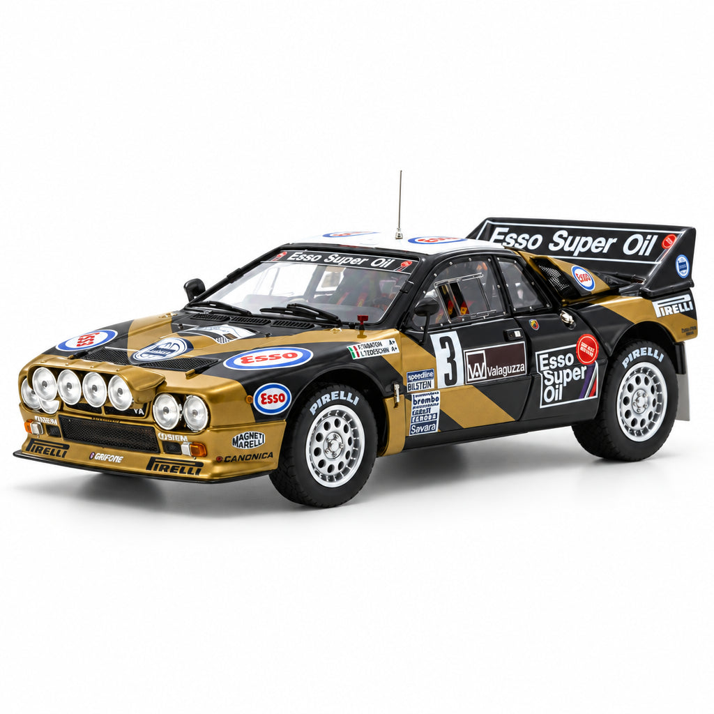 A scale model of a classic Esso Super Oil rally car, featuring a gold and black livery with various sponsor decals including Pirelli, Alfa Romeo, and Volkswagen, set against a plain white background.