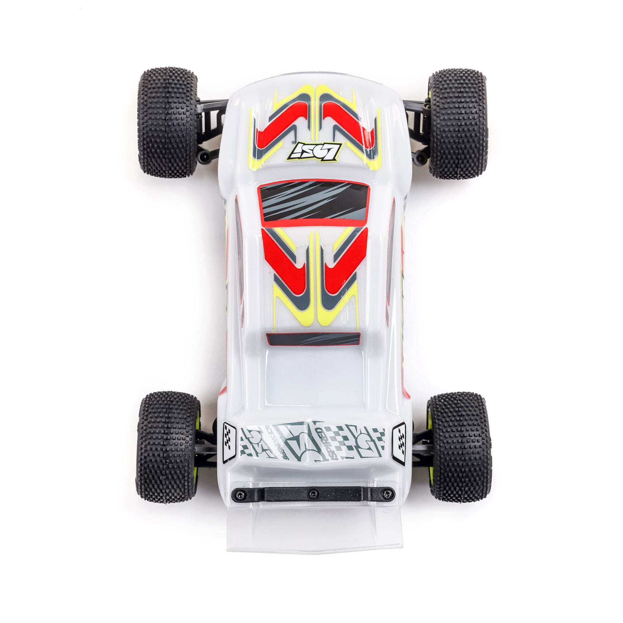 Small remote control car with clear body and colorful decals on a white background