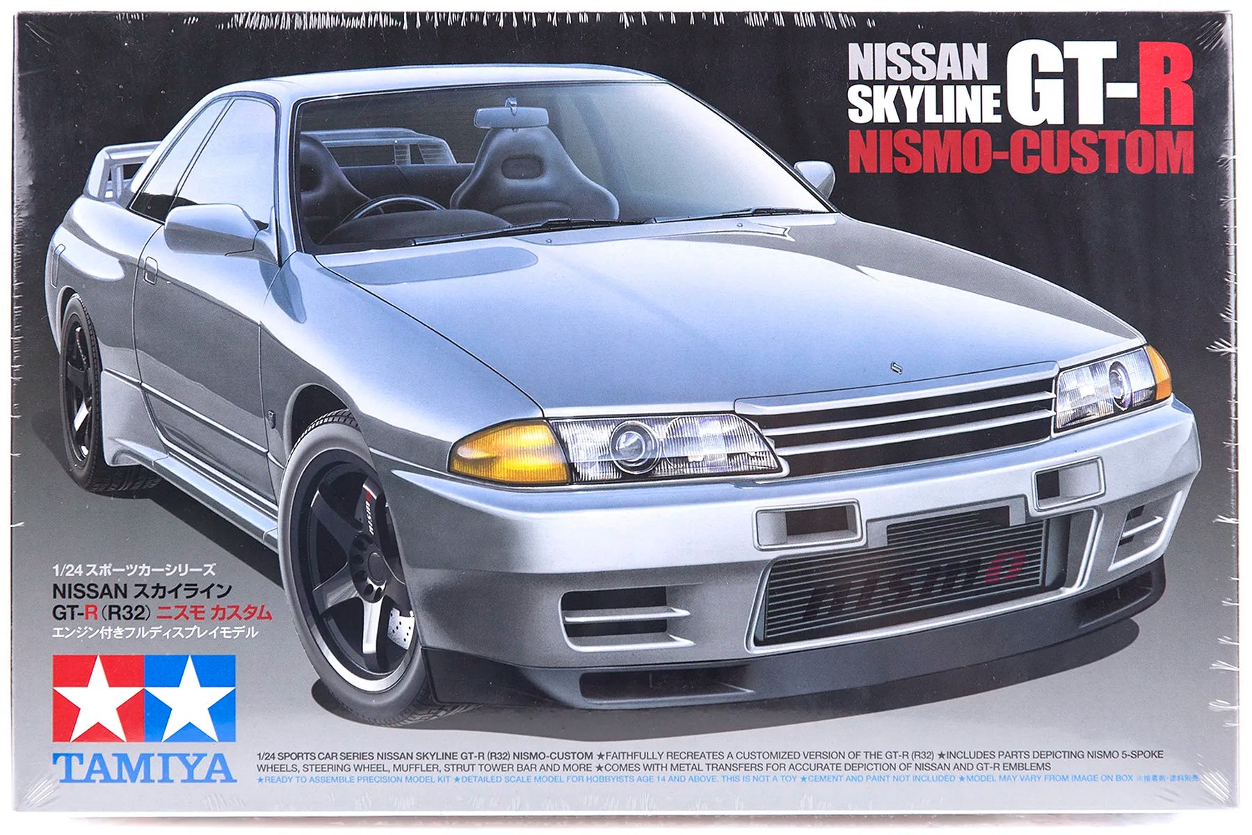 Model car kit packaging for Nissan Skyline GT-R Nismo-Custom by Tamiya on a black background