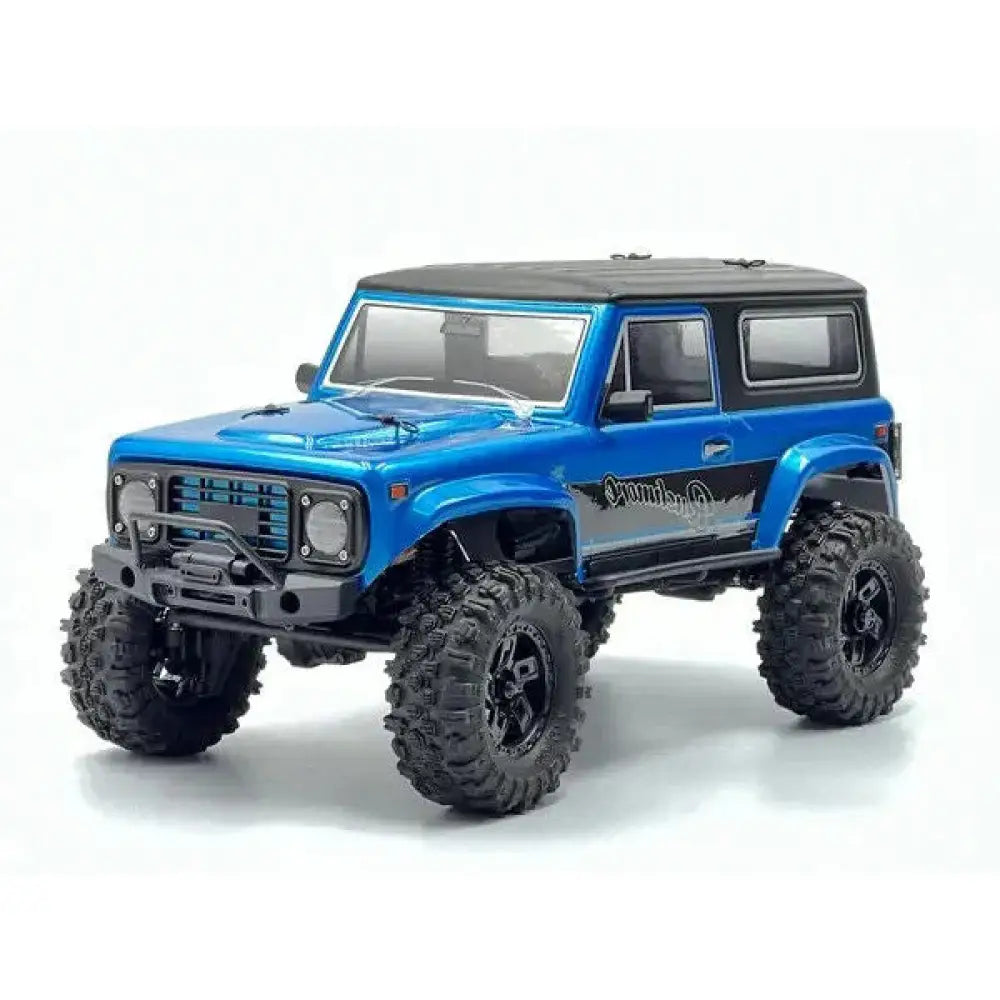 Blue off-road model vehicle on a white background