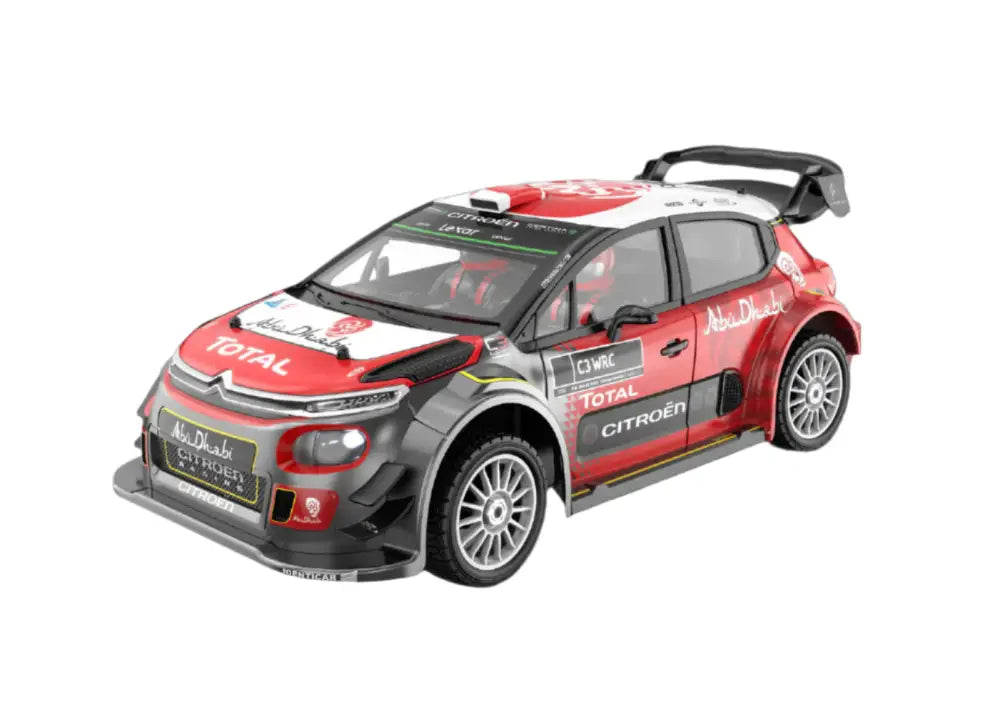 Model car of a MJX-7303 Citroen rally car with various sponsor logos on a white background