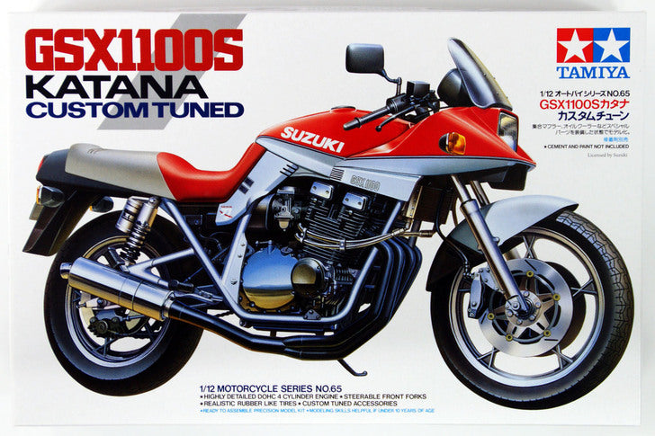 A Tamiya 1/12 scale model kit of the Suzuki GSX1100S Katana motorcycle, featuring a red and silver color scheme with detailed bodywork and engine components.