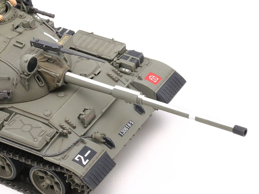 Tamiya 1/35 Tiran 5 Israeli Tank Plastic Model Kit main gun barrel close up on a white back ground.