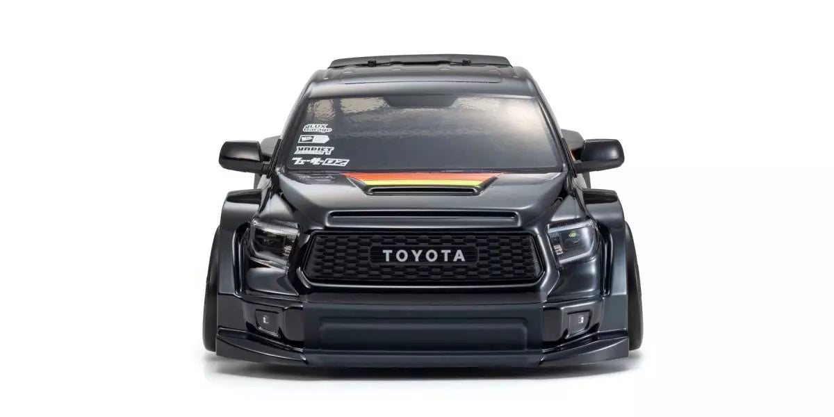 Kyosho 1/10 Fazer D2 2021 Toyota Tundra Drift RC car with a black and orange design on a white background