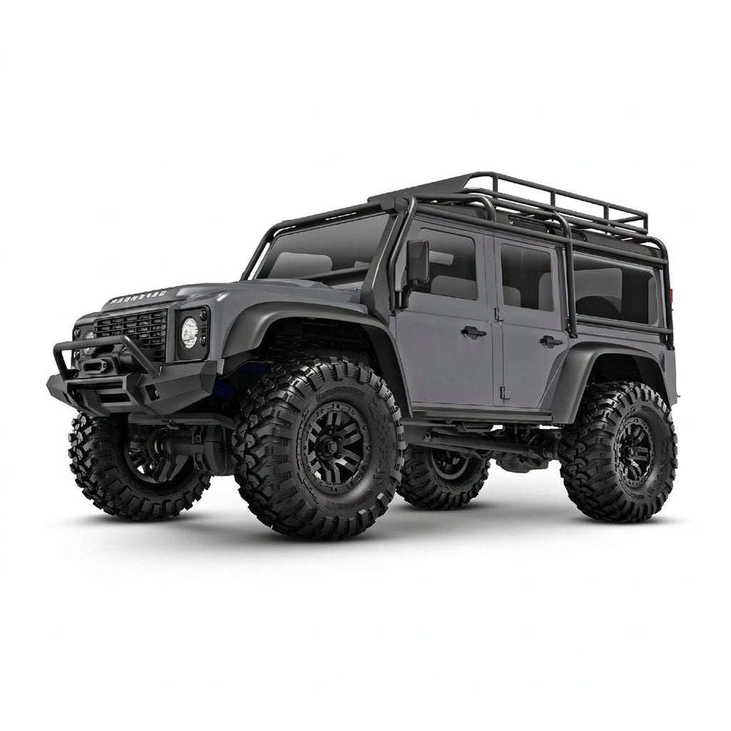 Gray off-road vehicle with large tires on a white background