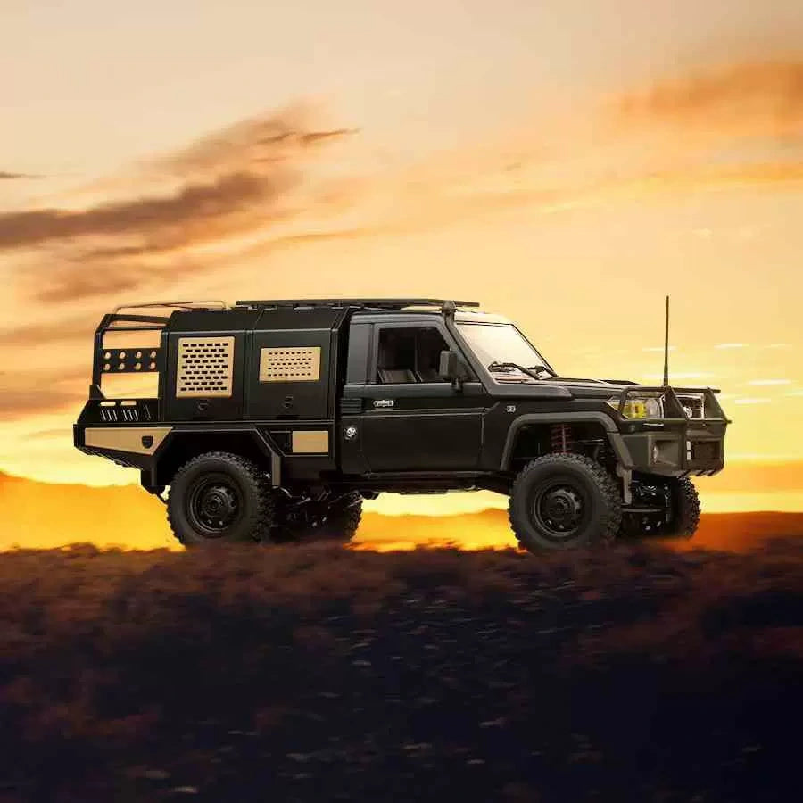 MN Model 1/12 Toyota LC79 4WD RC Crawler driving on a dirt road with background of a desert landscape with a sunset sky