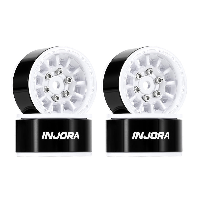 Two INJORA branded wheel rims on black stands against a white background