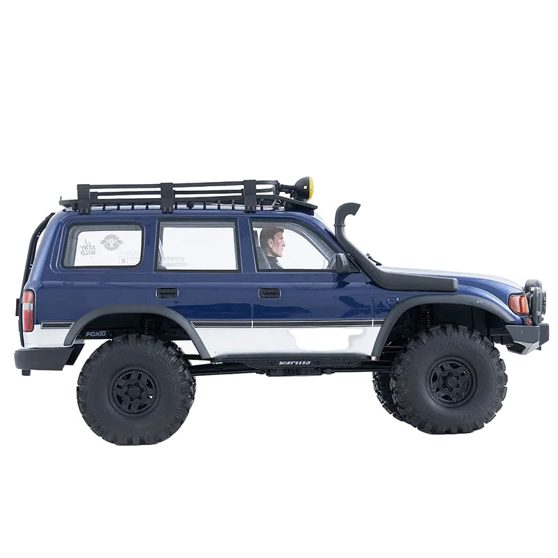 Blue off-road vehicle with large tires on a white background