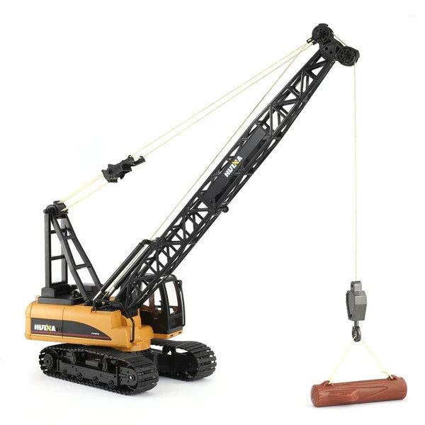 RC Model of a logging crane with tracks and lifting a log on a white background