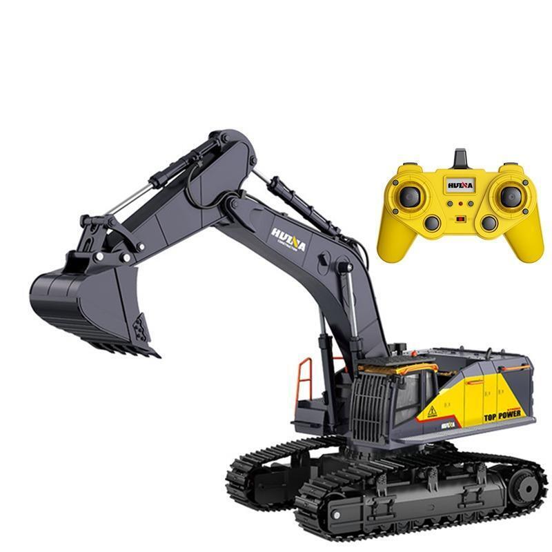 Toy excavator with remote control on a white background