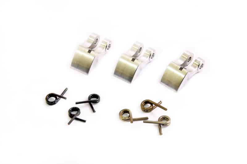 Set of small Hobao CNC Aluminum Rc Car Clutch shoe metal components and springs on a white background
