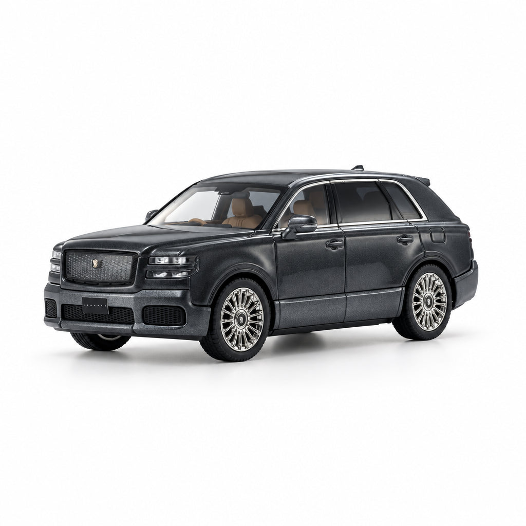 A dark gray luxury SUV model car,  shown from a three-quarter front angle on a clean white studio background.