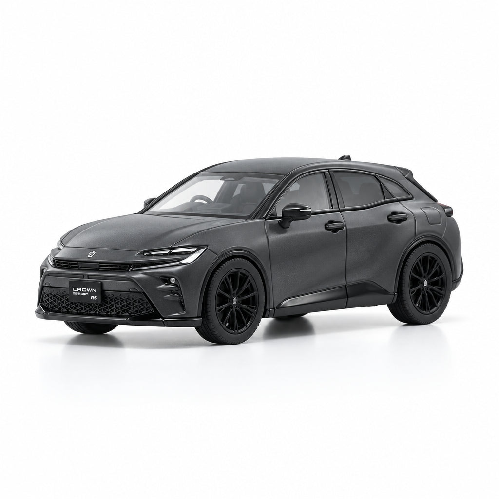 A dark gray compact SUV with black wheels, shown from a three-quarter front angle on a clean white studio background.