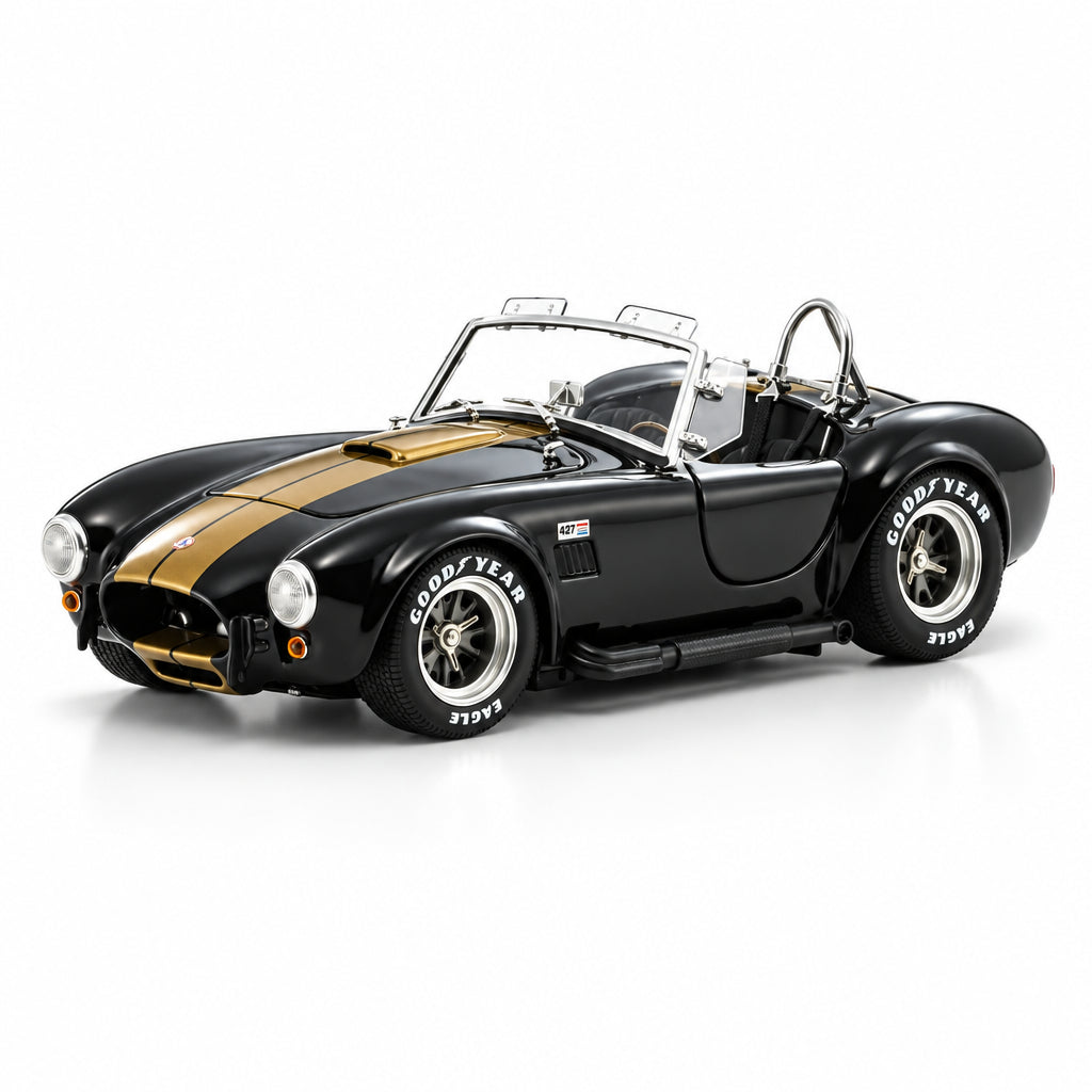 Black and gold classic car with 'GoodYear' tires on a white background