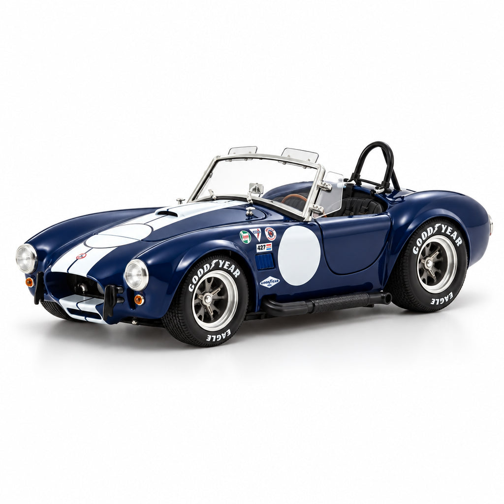 Blue and white vintage car model on a white background