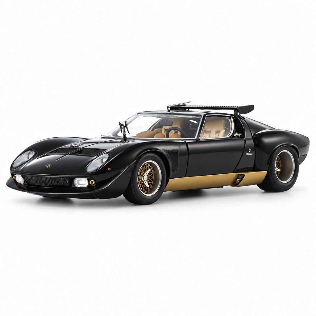 A black model sports car with gold side stripes and gold-rimmed wheels, photographed on a clean white studio background.