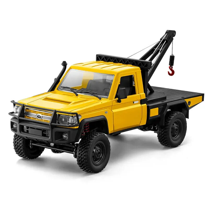 Yellow toy truck with a flatbed and crane on a white background