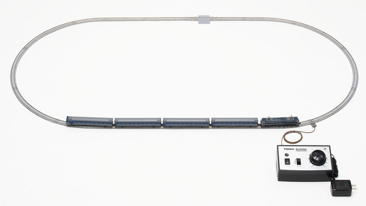 Overhead view of Tomix N Scale Blue Train track layout with rail pattern A and PU N-600 control equipment