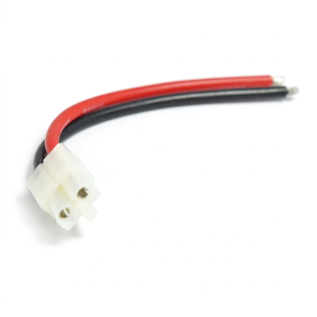 A small electrical connector with two wires, one red and one black, attached to a white plastic two-pin male connector, shown on a plain white background.