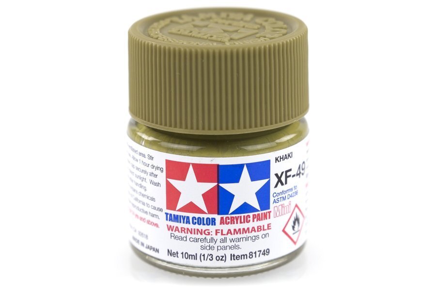 A small bottle of Tamiya Acrylic Mini XF-49 Khaki paint for model making.