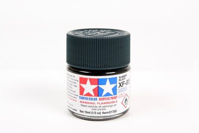 Tamiya model paint jar with black lid on a white background