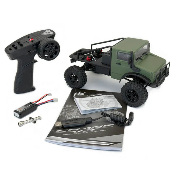 Green remote control truck with accessories on a white background