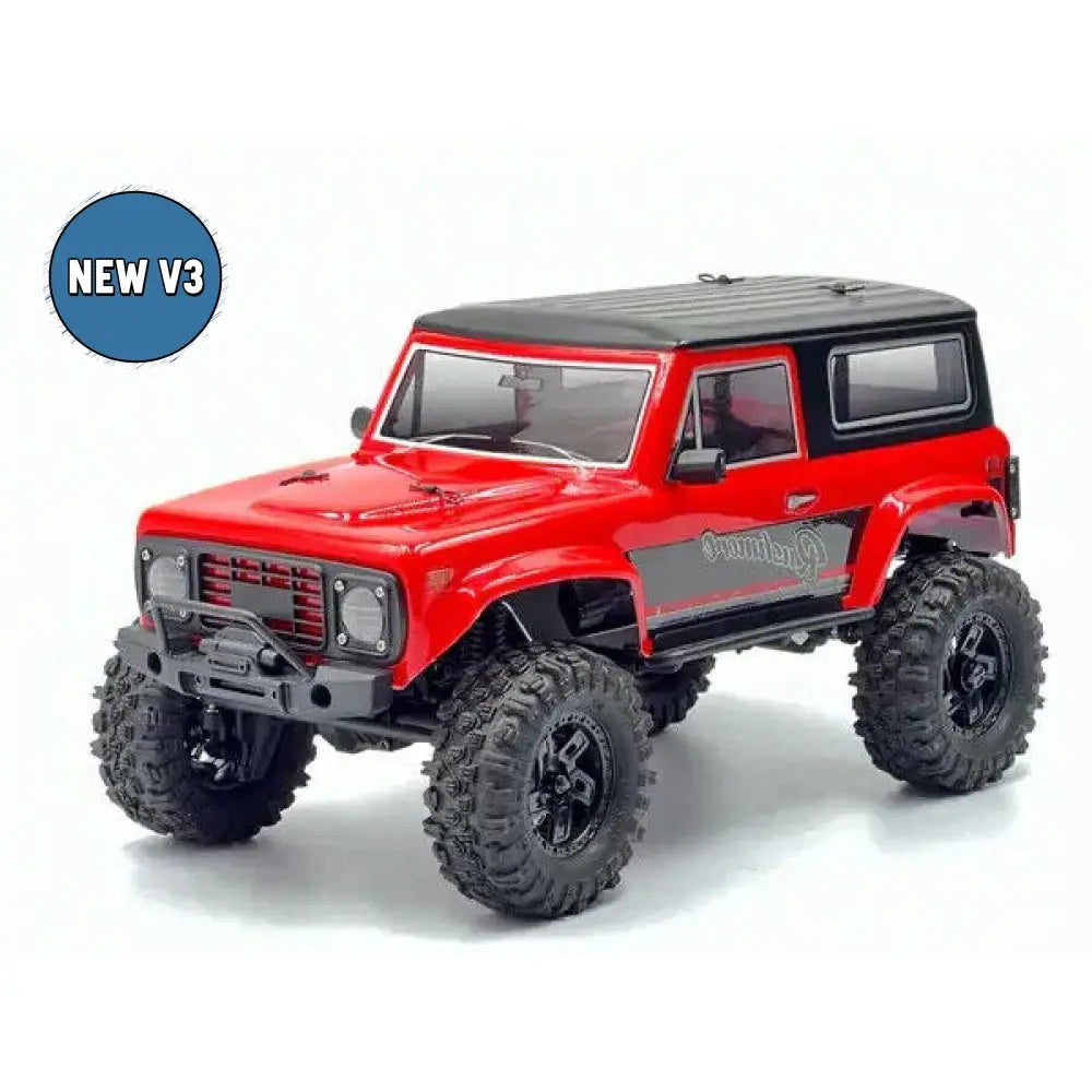 Red off-road model vehicle with black roof on a white background