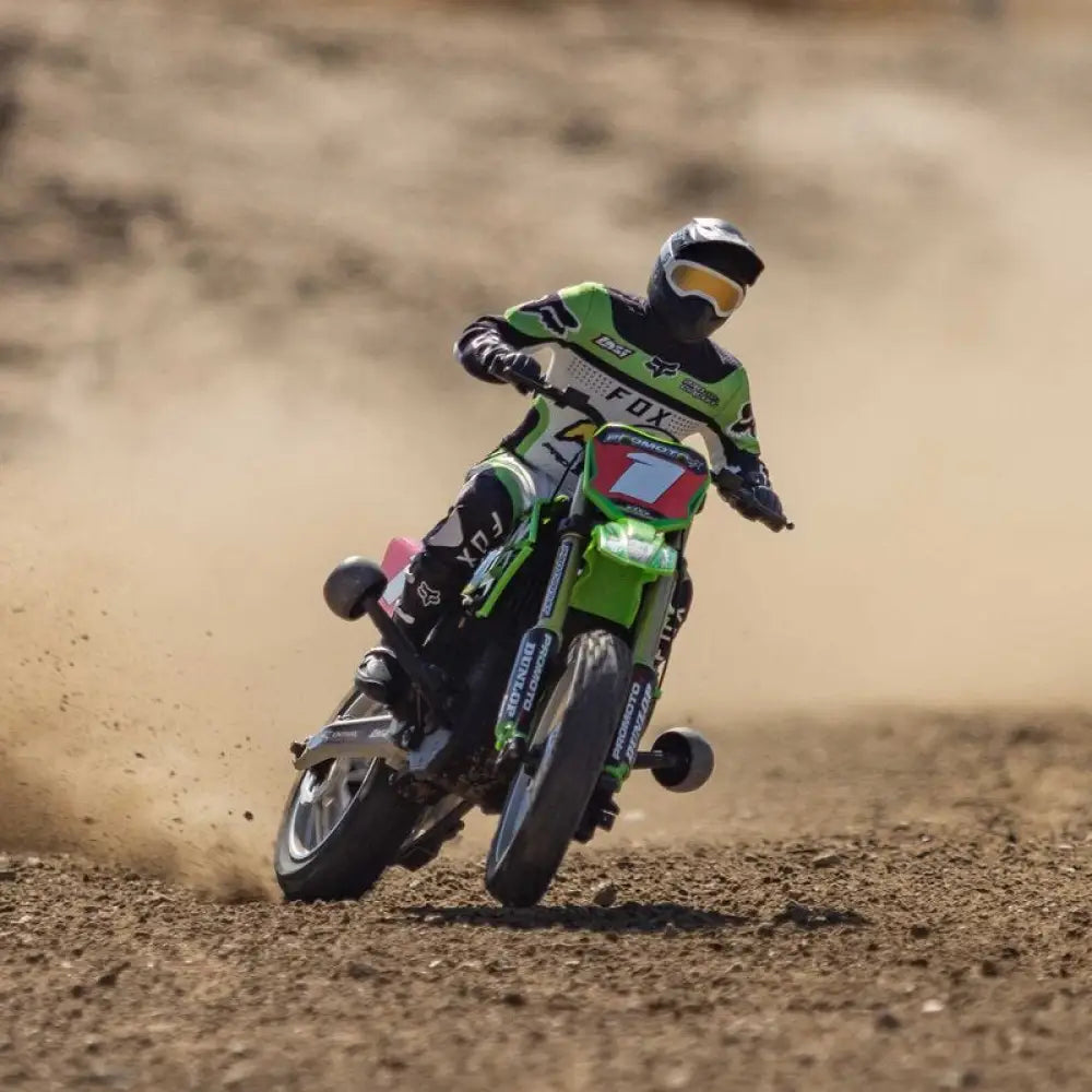  Losi Promoto-MX 1/4 Dirt Bike racer in action on a dirt track