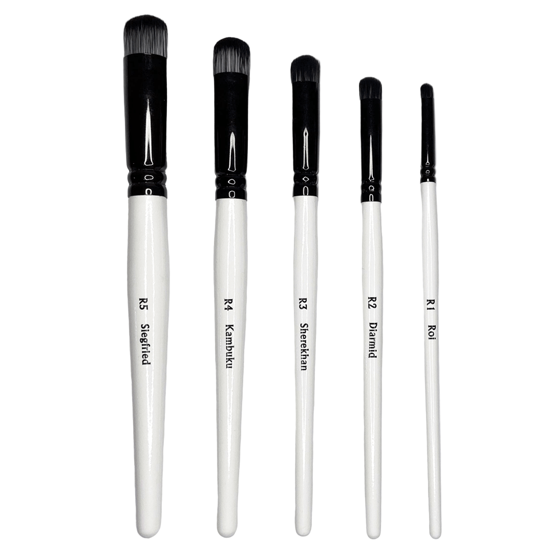 Set of five makeup brushes with black handles and white ferrules on a light gray background